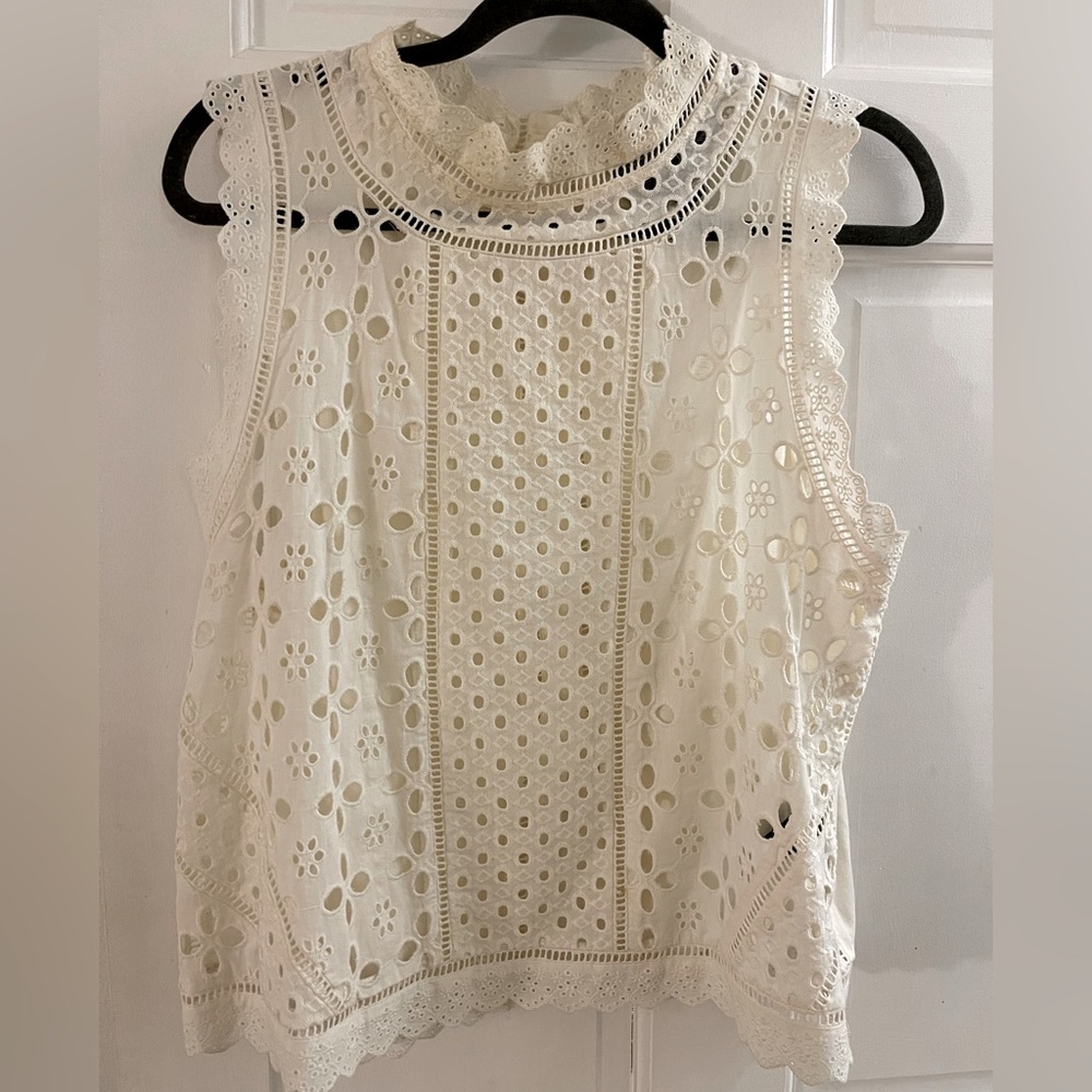 Anthropologie crochet top, high neck and button up back. Size L